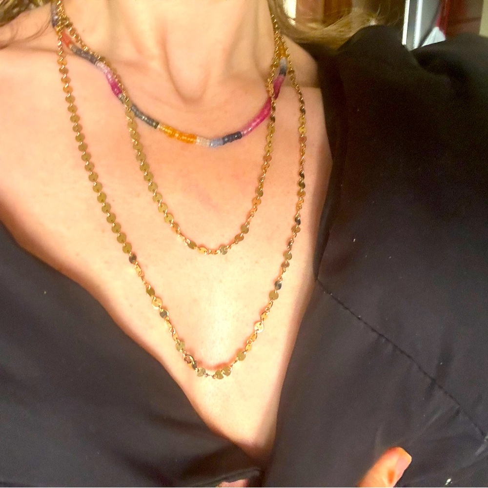 Gold necklace wear wrapped @ least twice to accentuate decolleté. Layer piece.